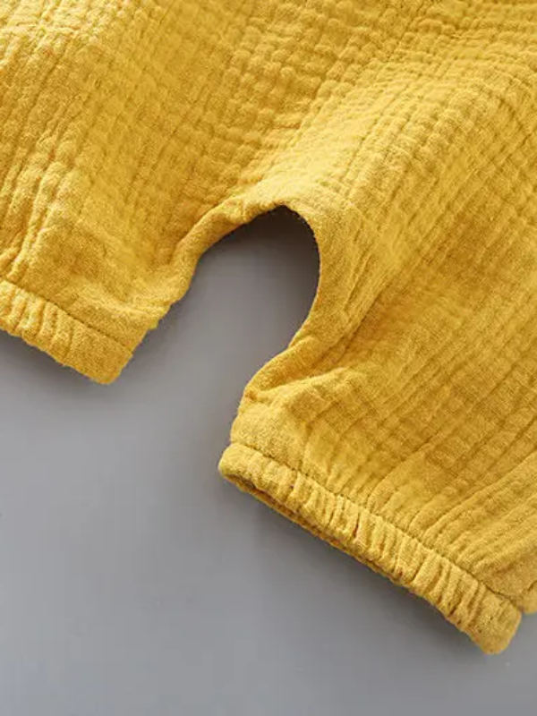 <tc>Kombinezon i koszulka Klowy żółte</tc>